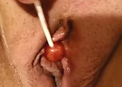 Hot Wife playing with candy